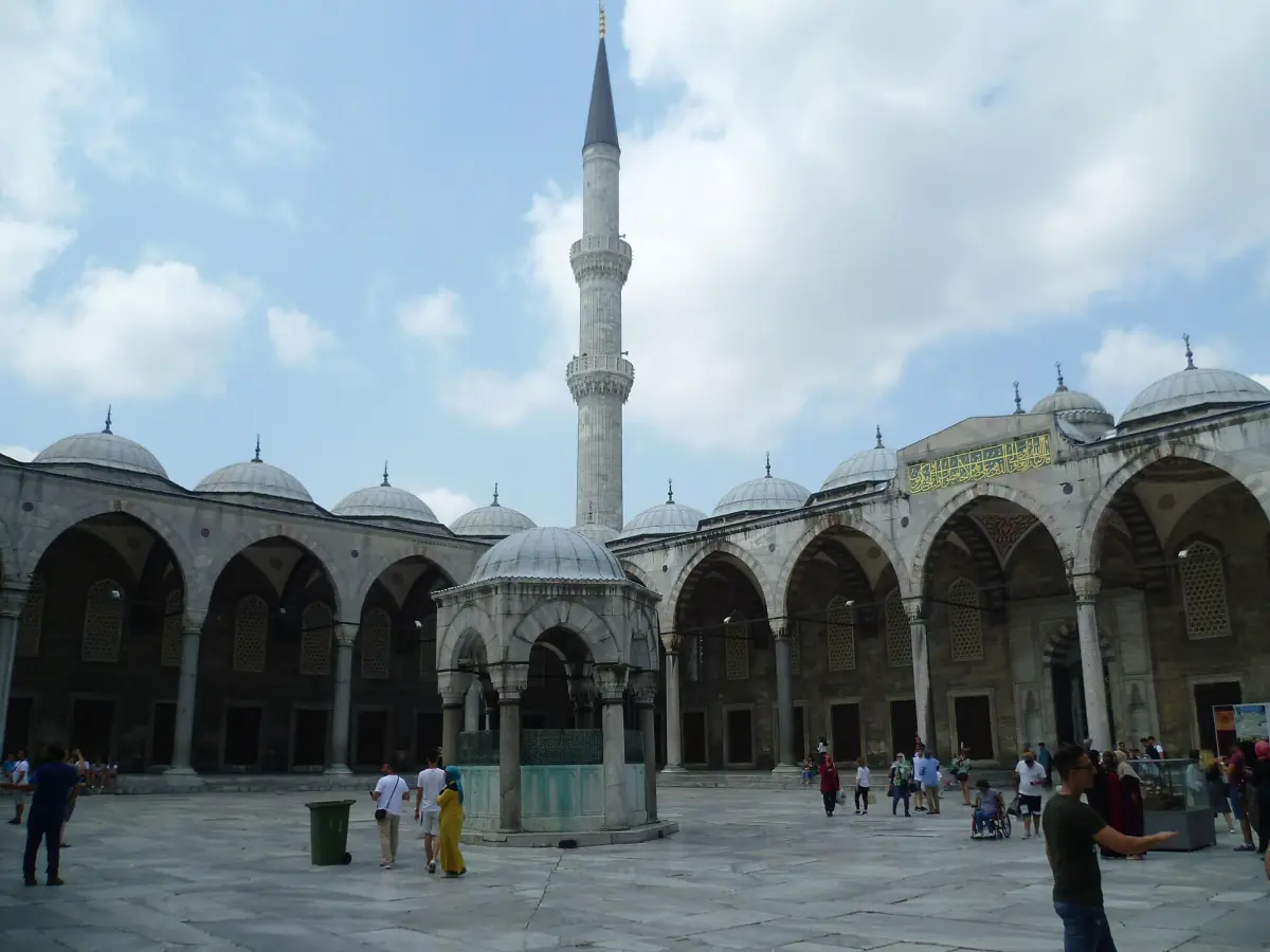 Visitors in the courtyard of the Sultan Ahmed Mosque
